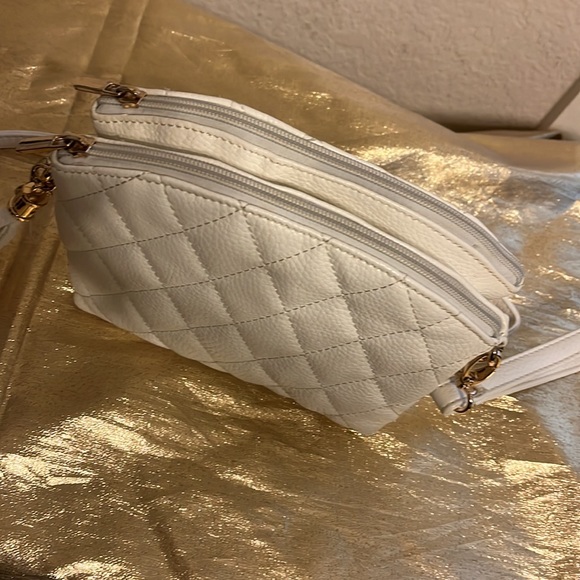 Reduced Quilted White Purse with Tassel and Gold Accents - Picture 8 of 12